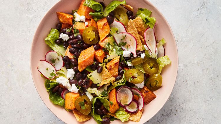 sweet potato taco salad served in pink bowl