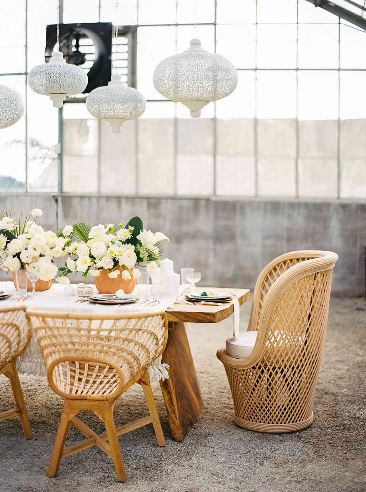 wicker chairs brunch party table setting