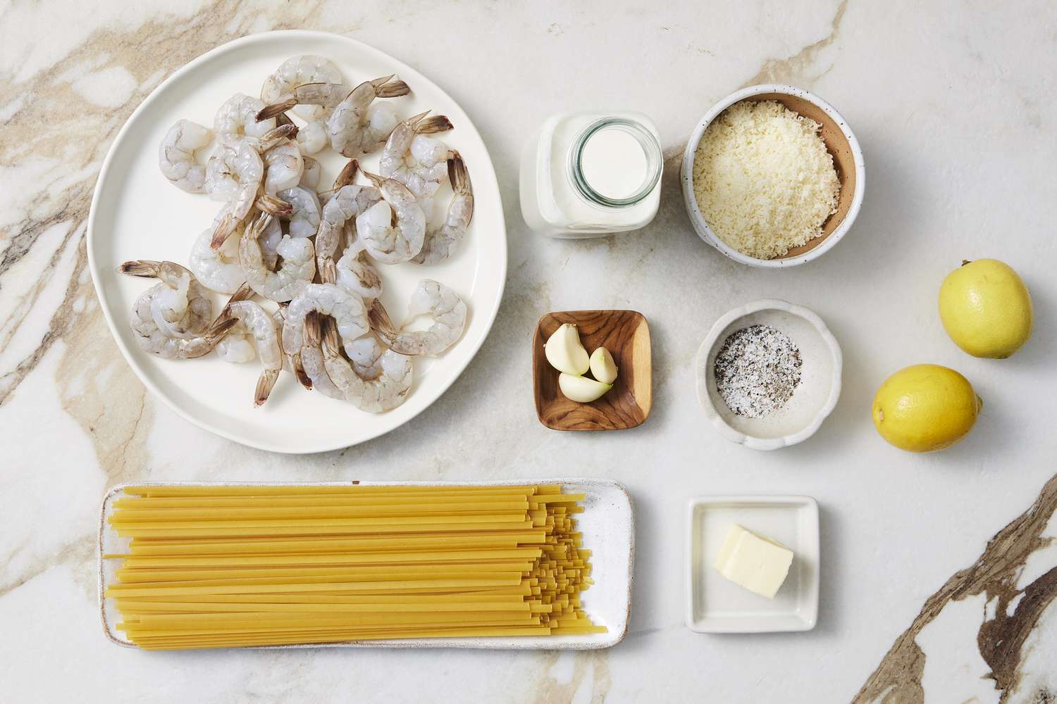 Pasta, shrimp, salt, lemon, ingredients for shrimp alfredo
