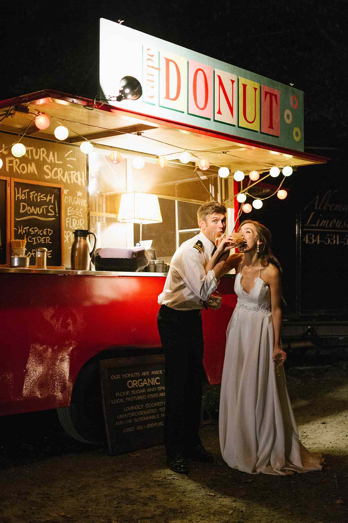 anne and staton wedding eating donuts