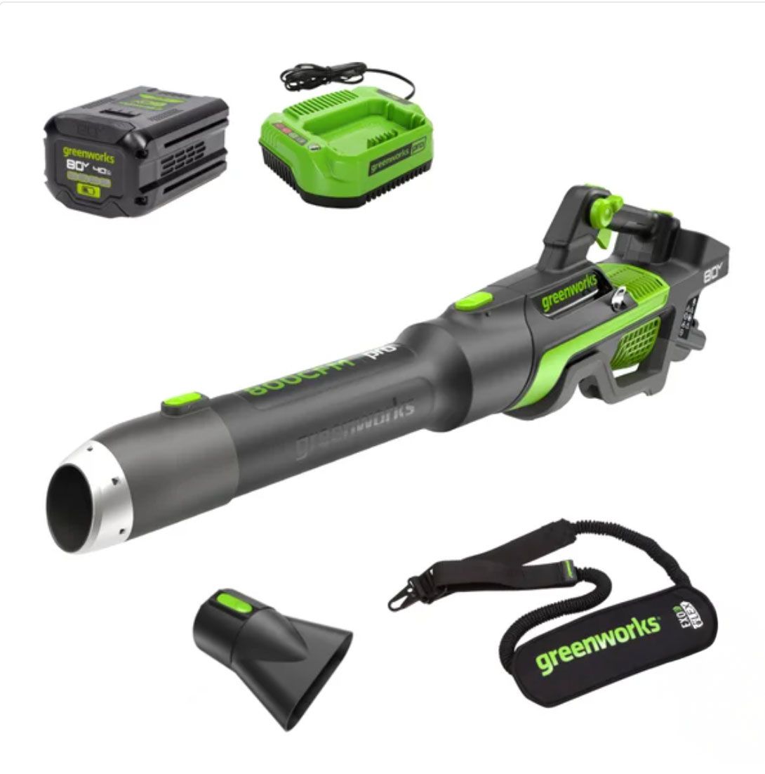A Greenworks cordless leaf blower accessories and battery charger