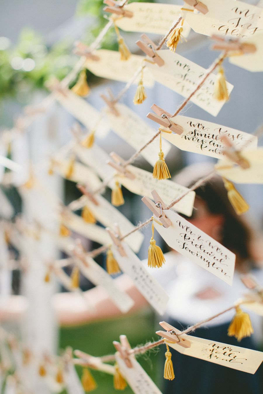 seating cards with yellow tassels