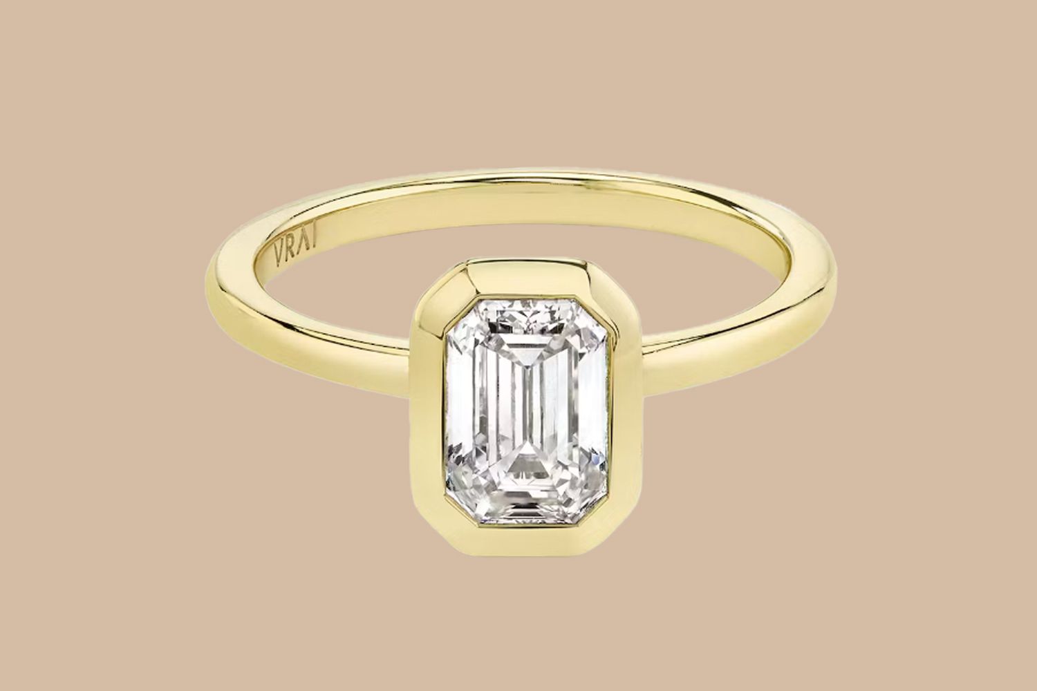 The Signature Bezel Emerald Engagement Ring