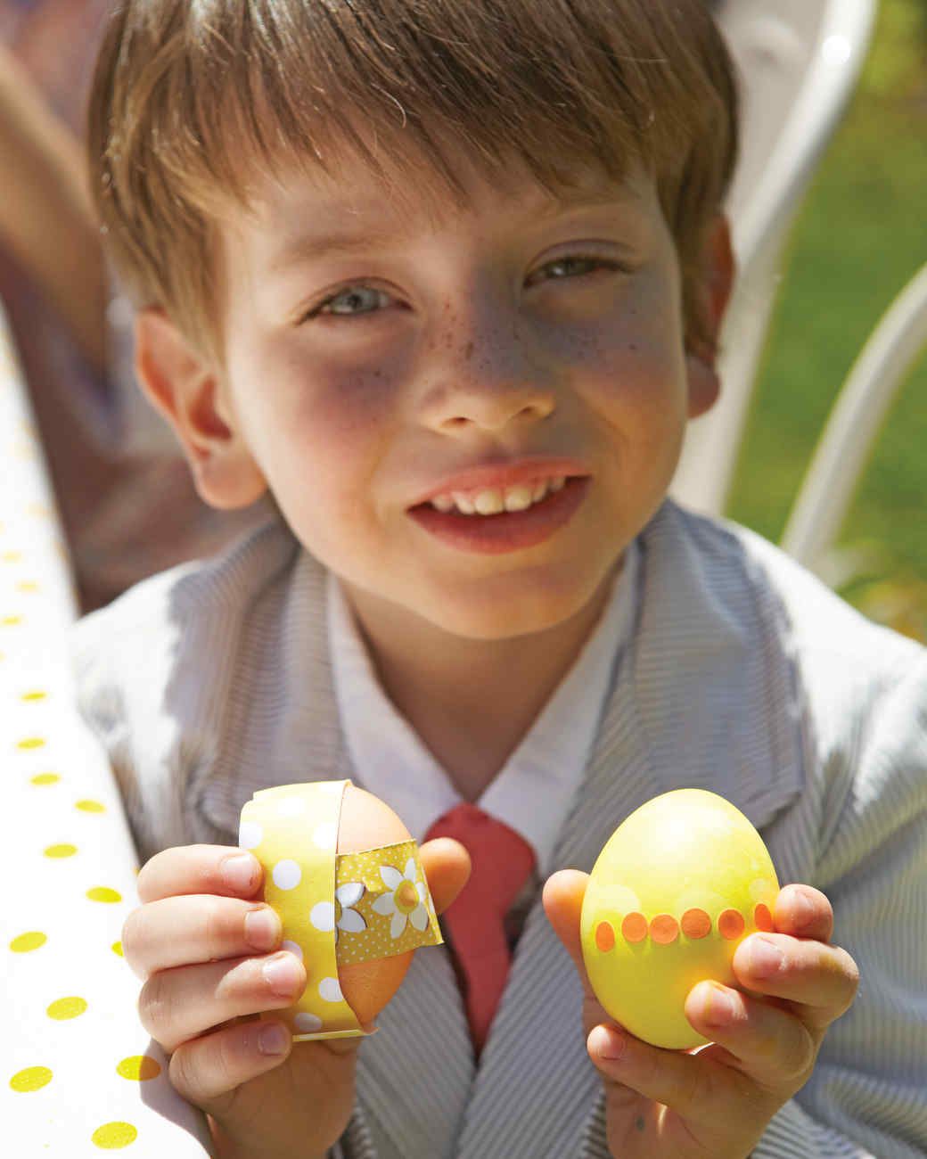 boy holding Easter eggs