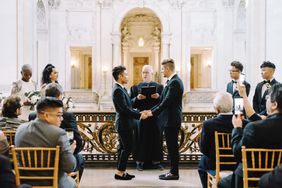 grooms during wedding ceremony at city hall