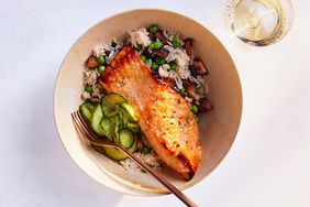 salmon-shiitake rice bowls served with cucumber