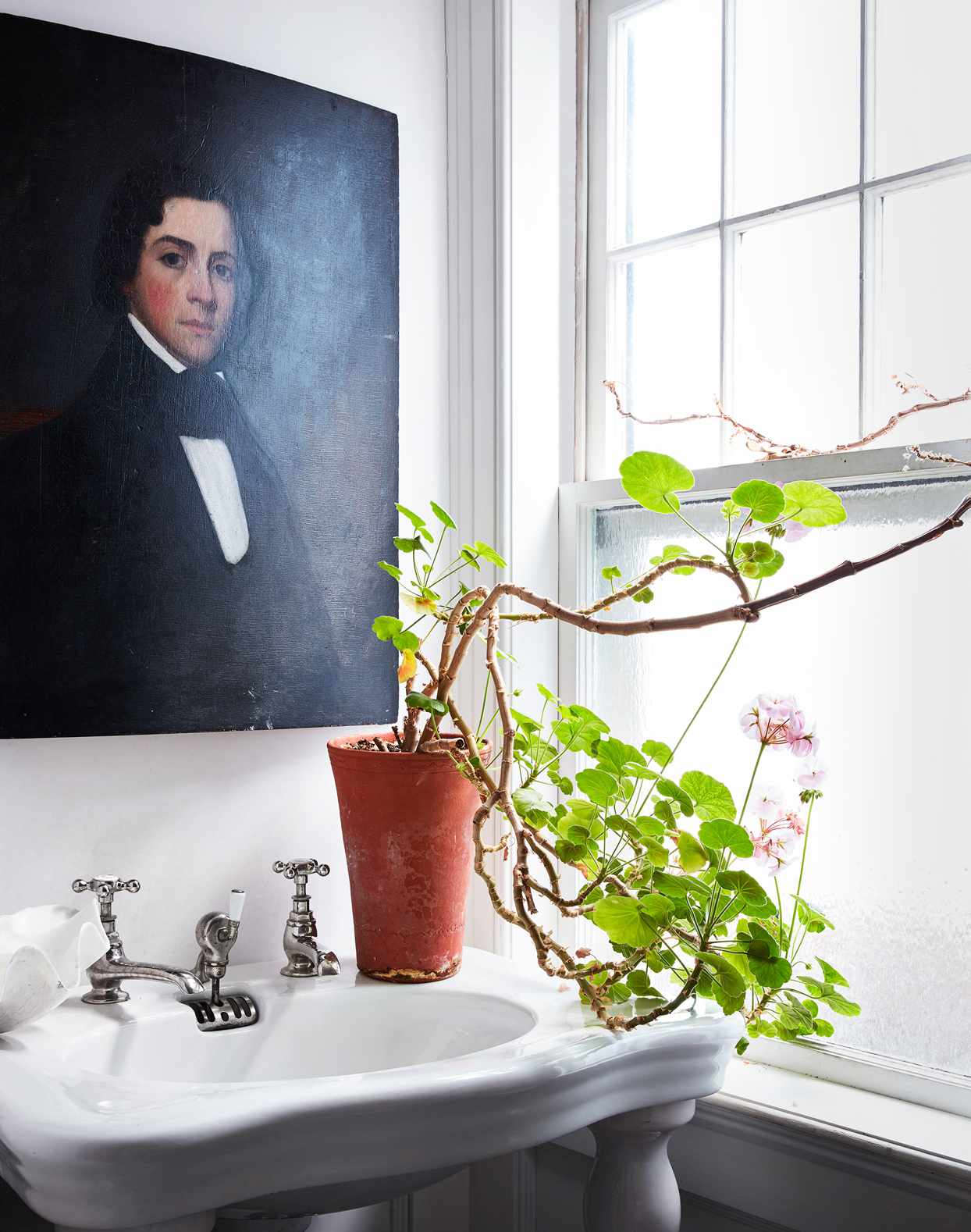 portrait in bathroom replacing mirror