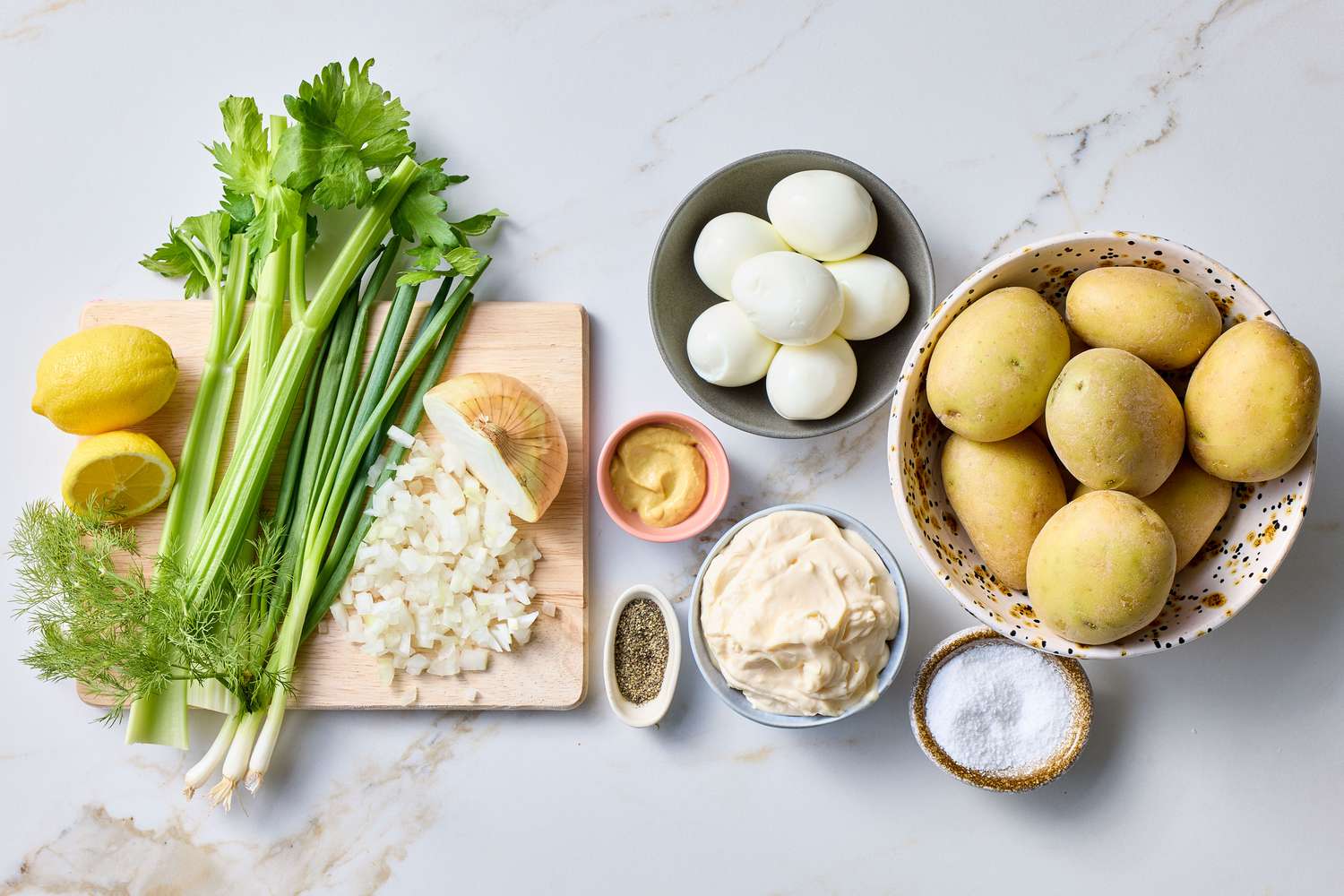 Ingredients for classic potato salad on a countertop