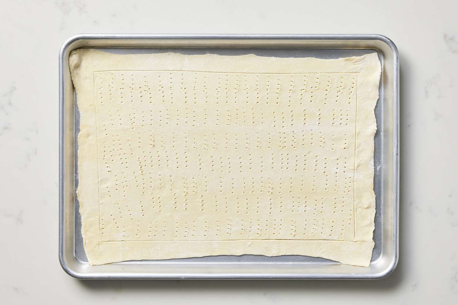 Pastry dough on baking sheet