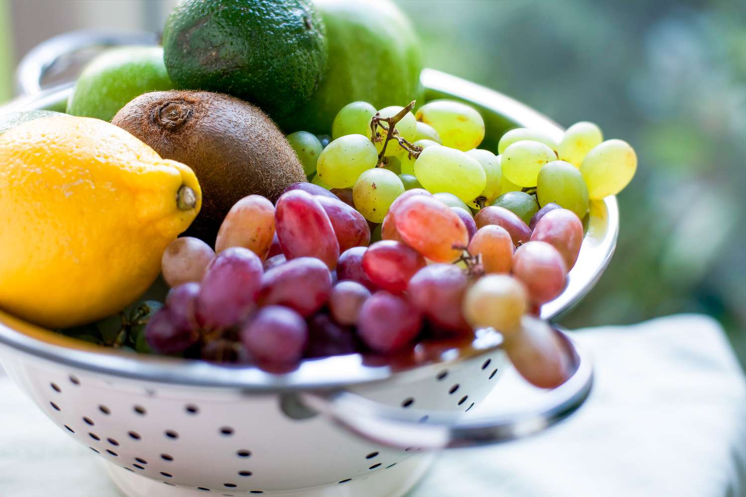 Bowl of grapes and citrus