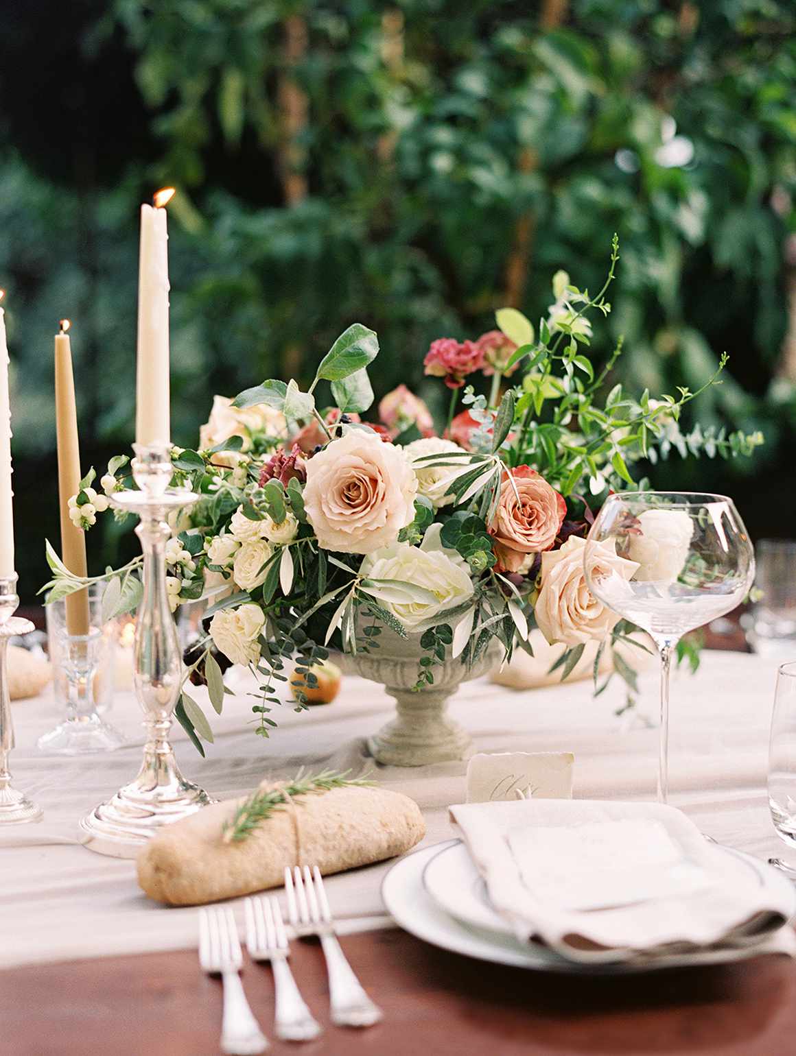 kelly pete wedding floral centerpiece in urn