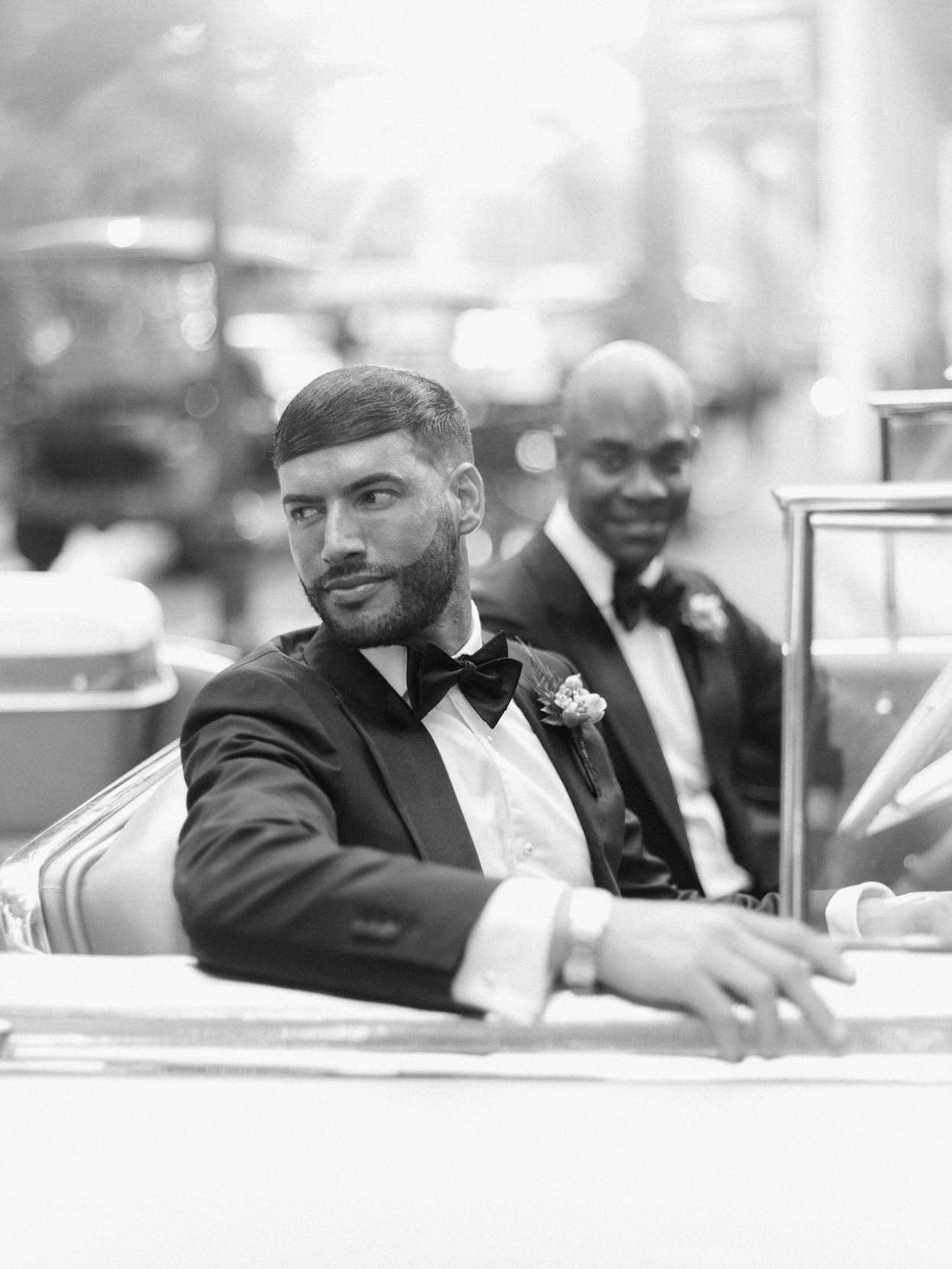 grooms in wedding car