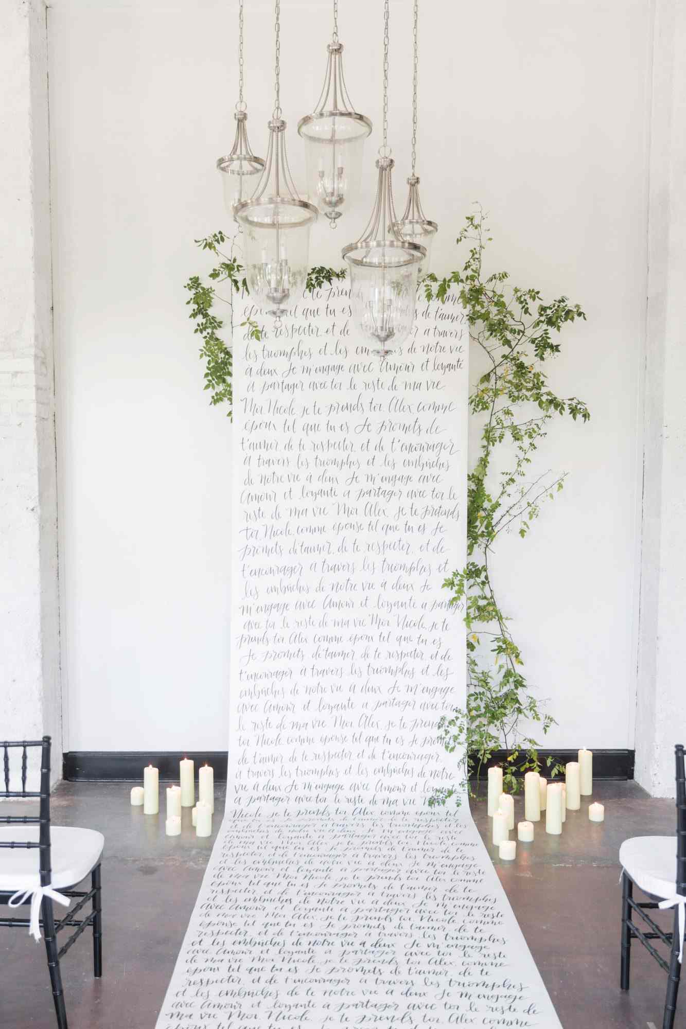 wedding ceremony scroll vows greenery candles