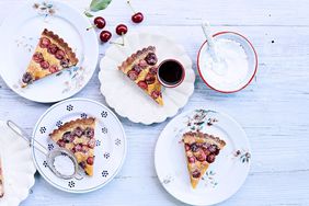 sour-cherry frangipane tart topped with powdered sugar