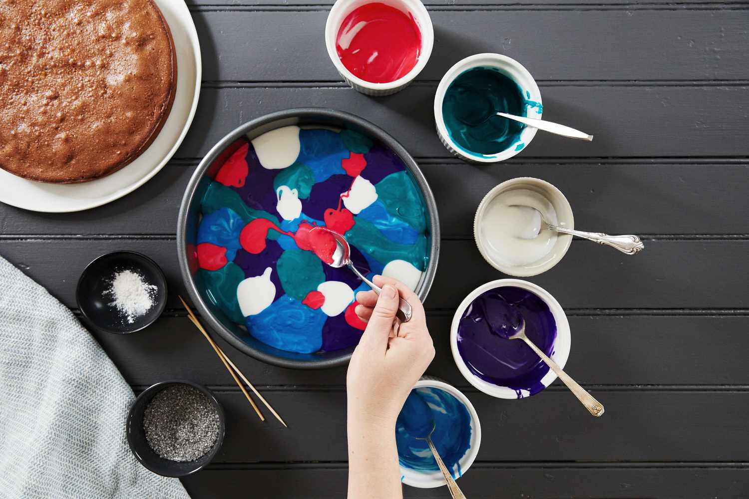 galaxy cake how-to dolloping colored frosting