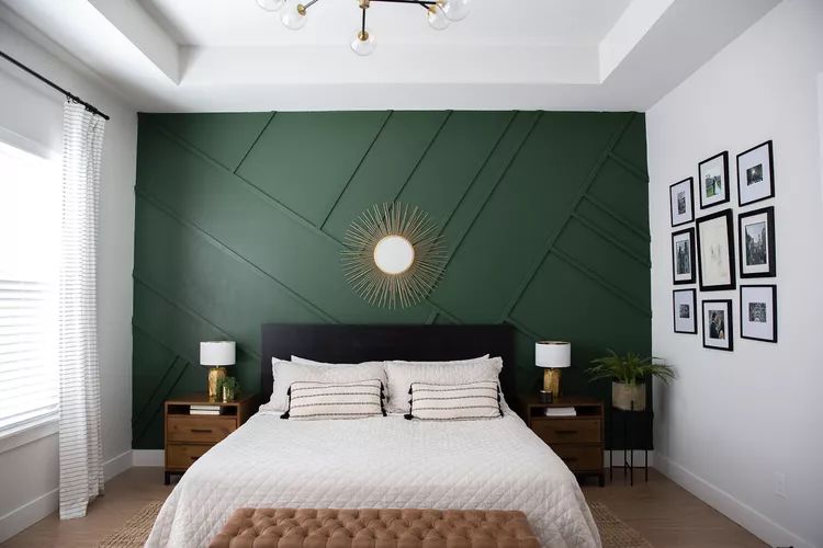 green accent wall in bedroom