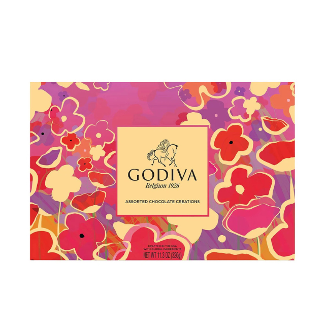 A box of Godiva Belgian chocolate with a floral design on the packaging