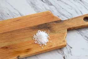 Salt on a wooden cutting board