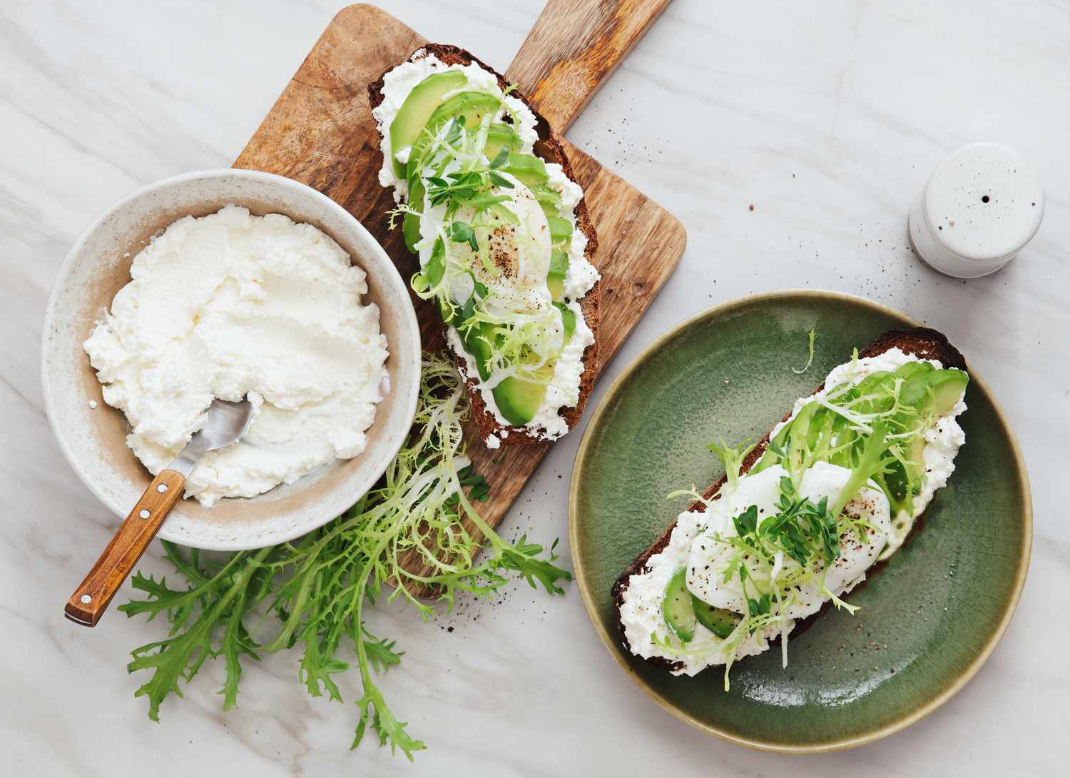 overhead view of ricotta toast and bowl of ricotta