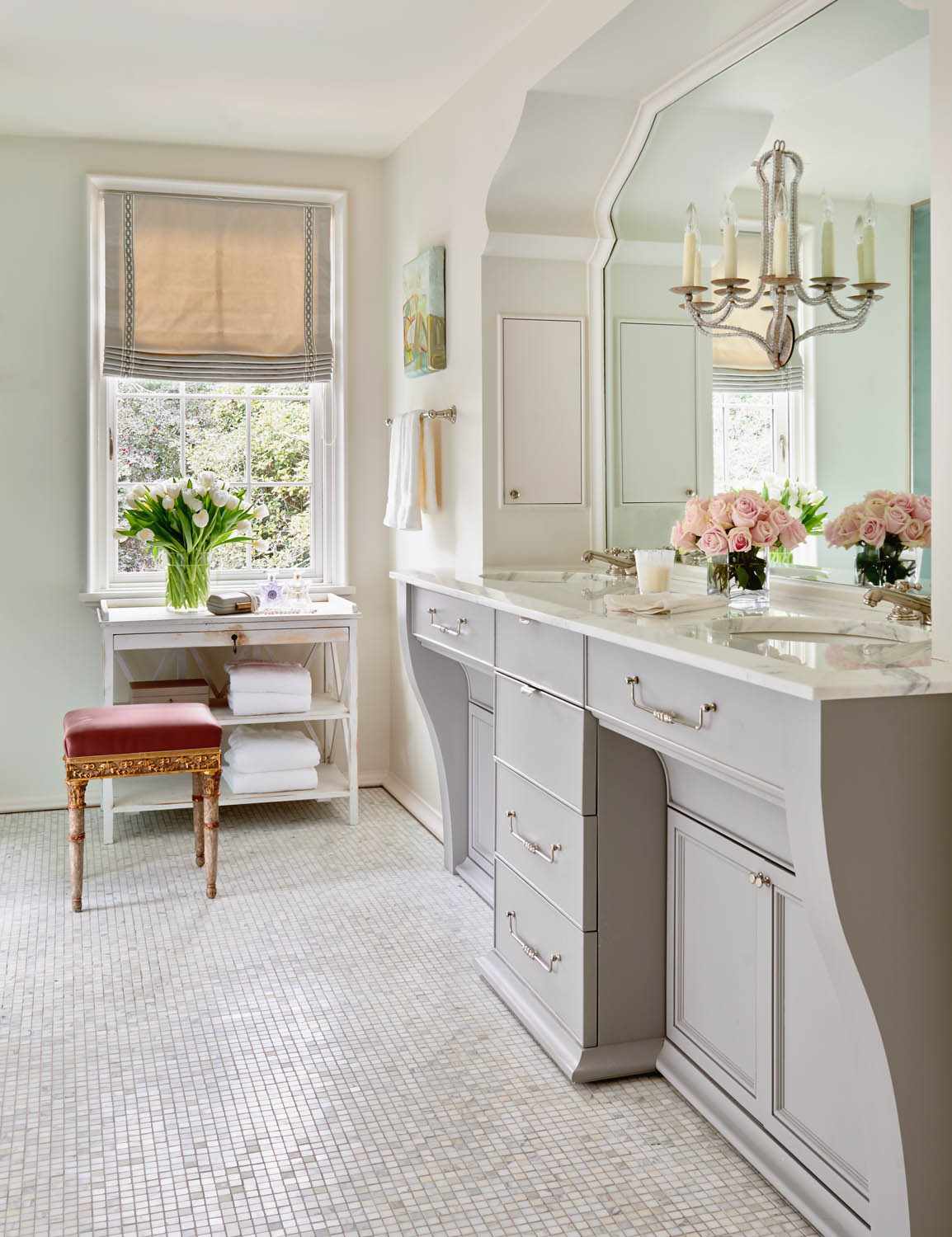 white bathroom with molding bathroom mirror