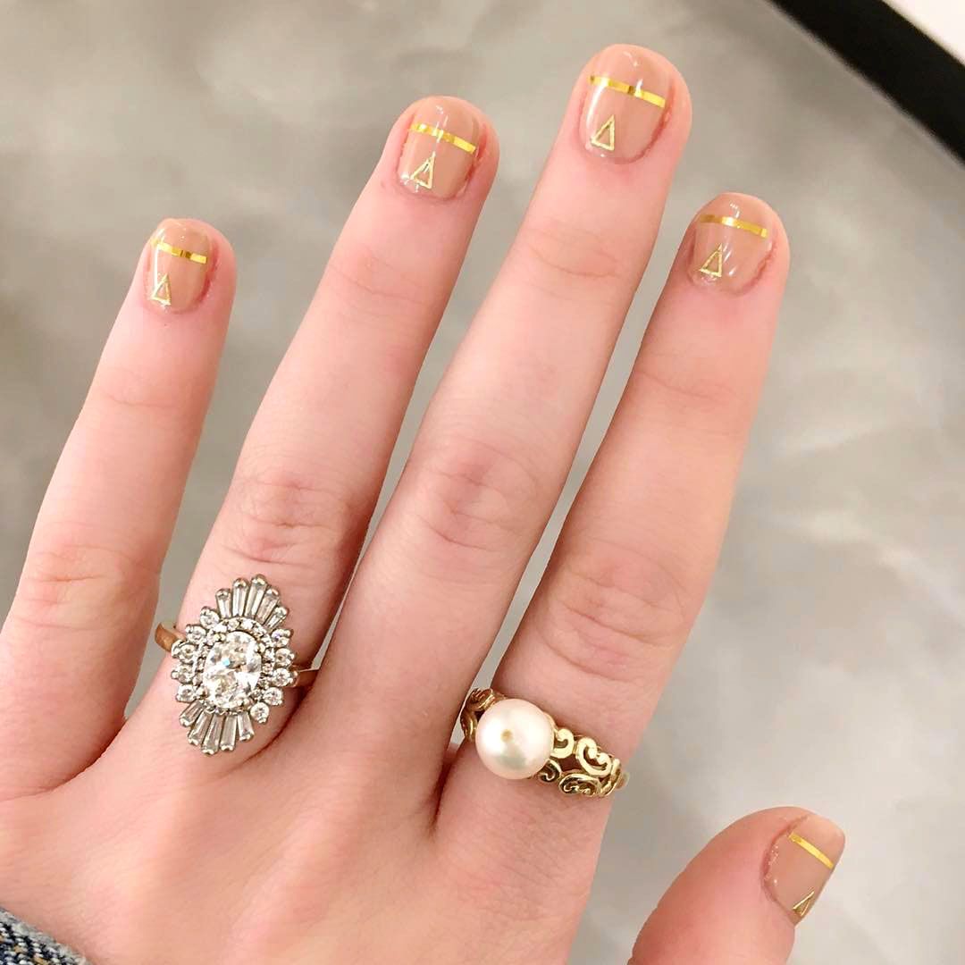 engagement ring selfie gold geometric manicure and pearl ring