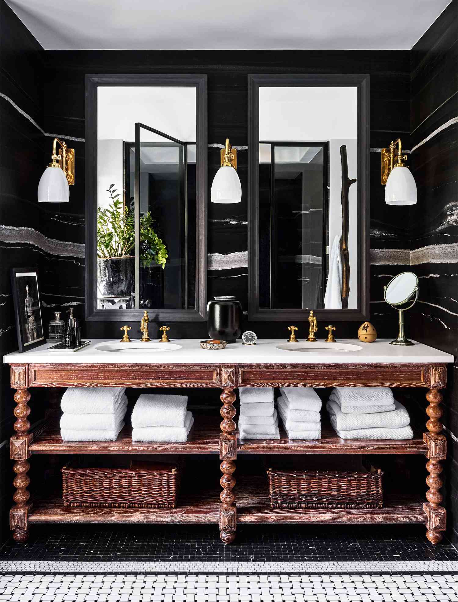 black stone bathroom with two bathroom mirrors