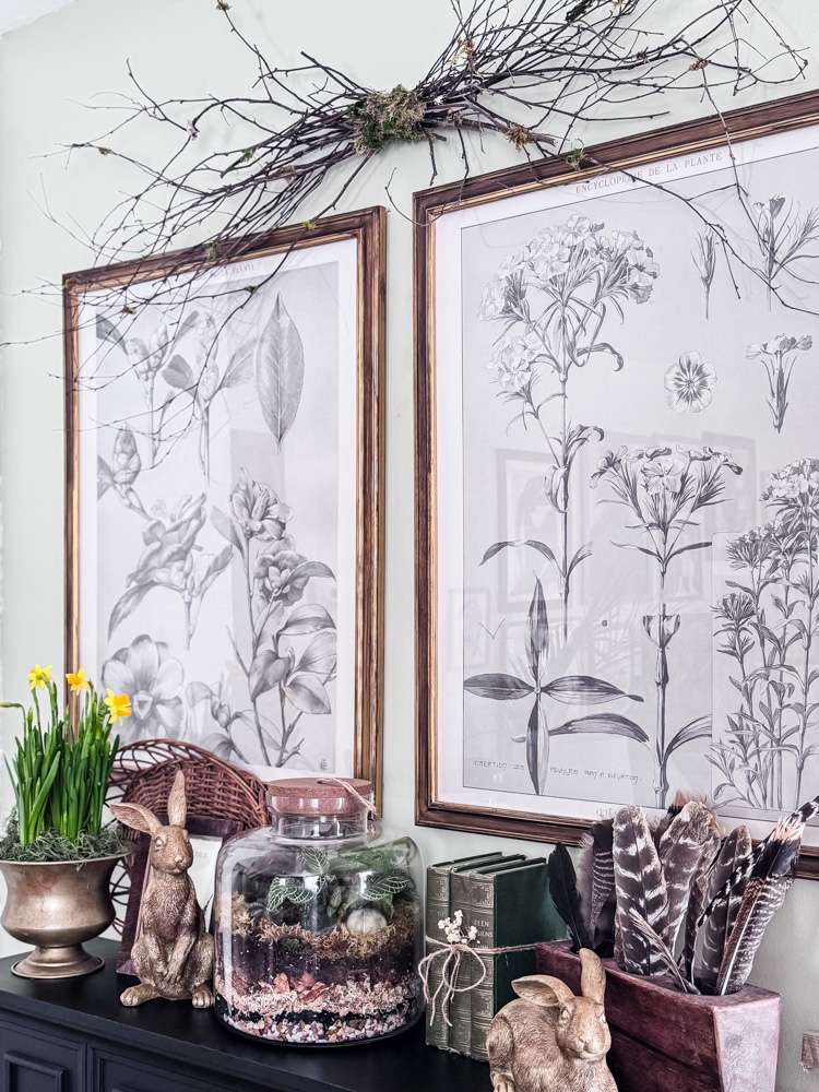 Bunch of branches hanging over artwork