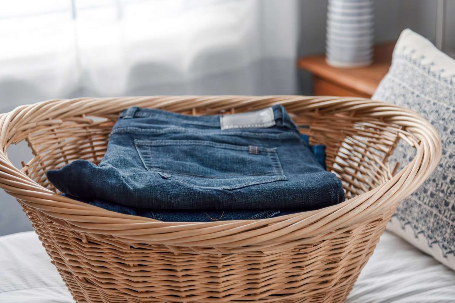 Jeans in a laundry basket