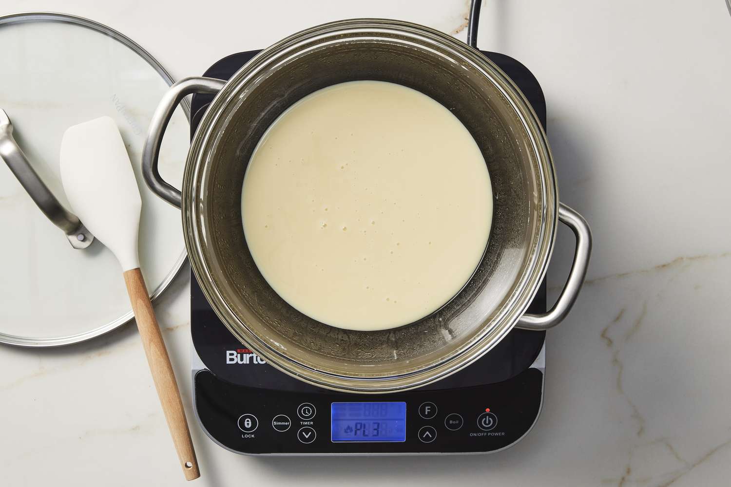 Condensed milk in double boiler pot