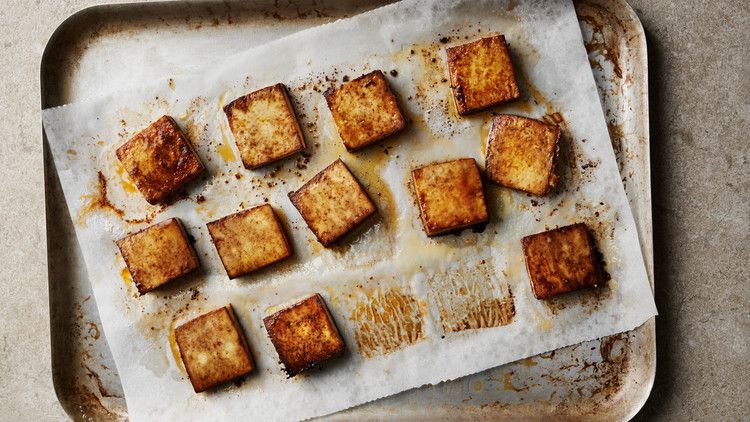 all-purpose baked tofu cubed on baking sheet