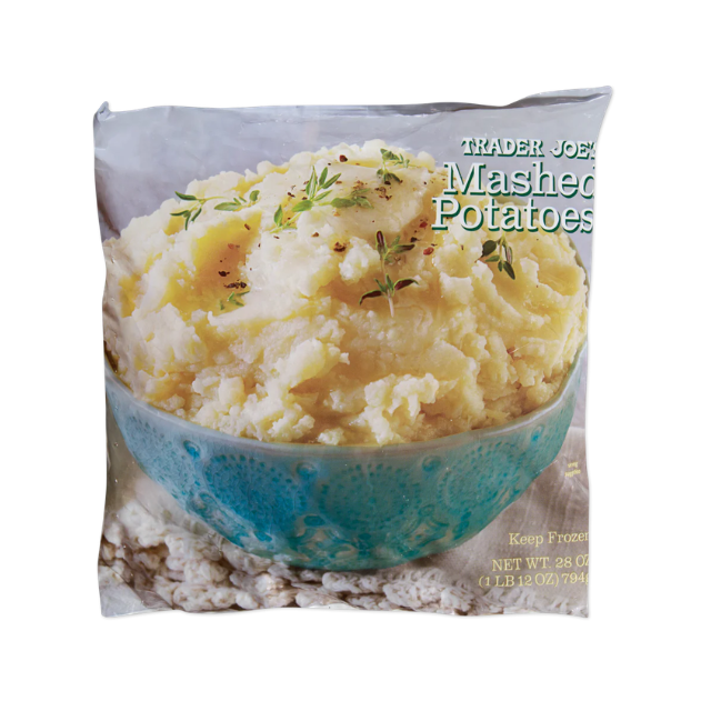 A package of Trader Joes mashed potatoes in a bowl