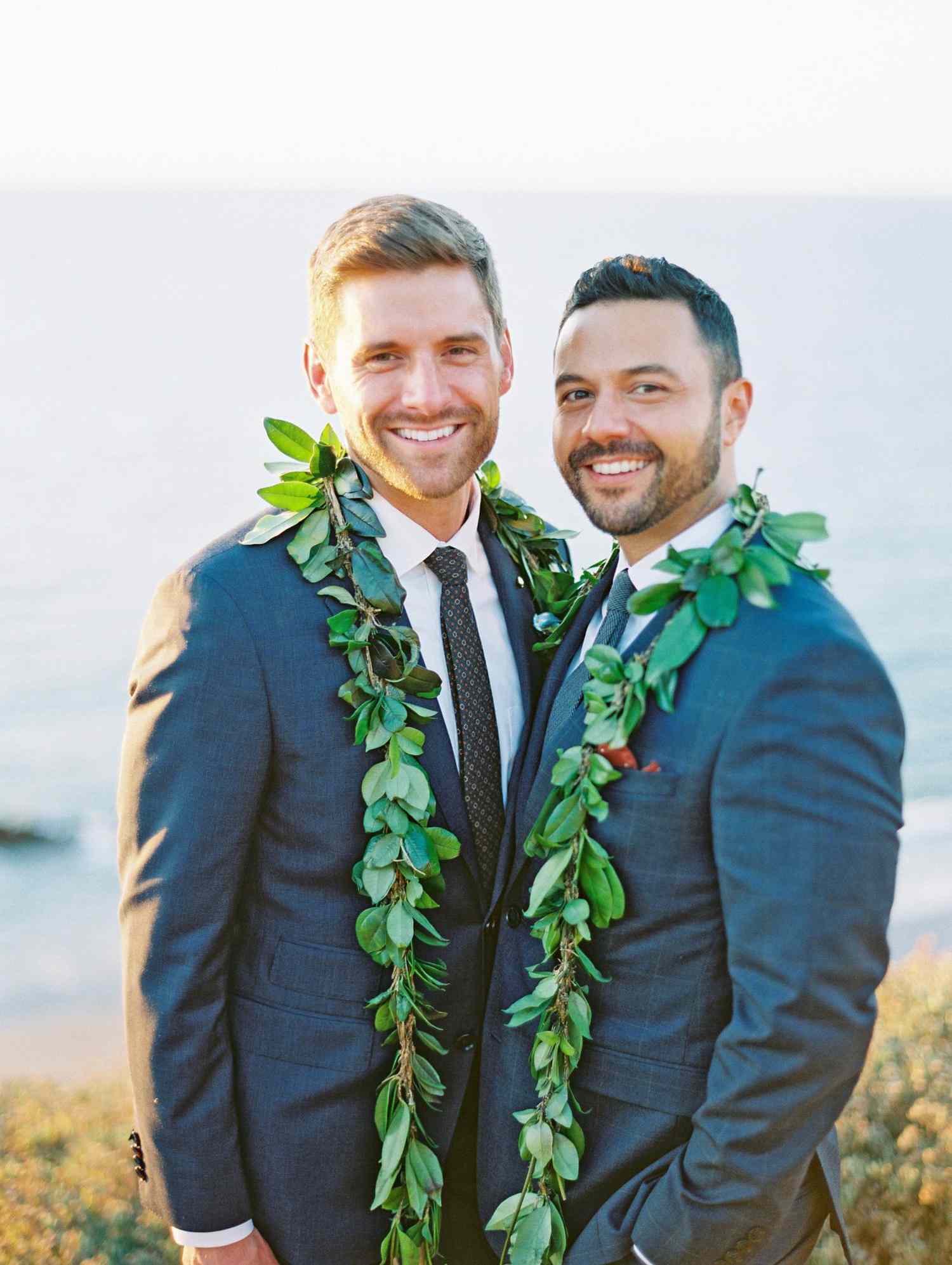rob franco wedding grooms leis around necks