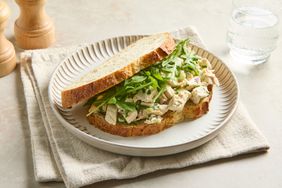 Chicken salad sandwich with lettuce on a plate