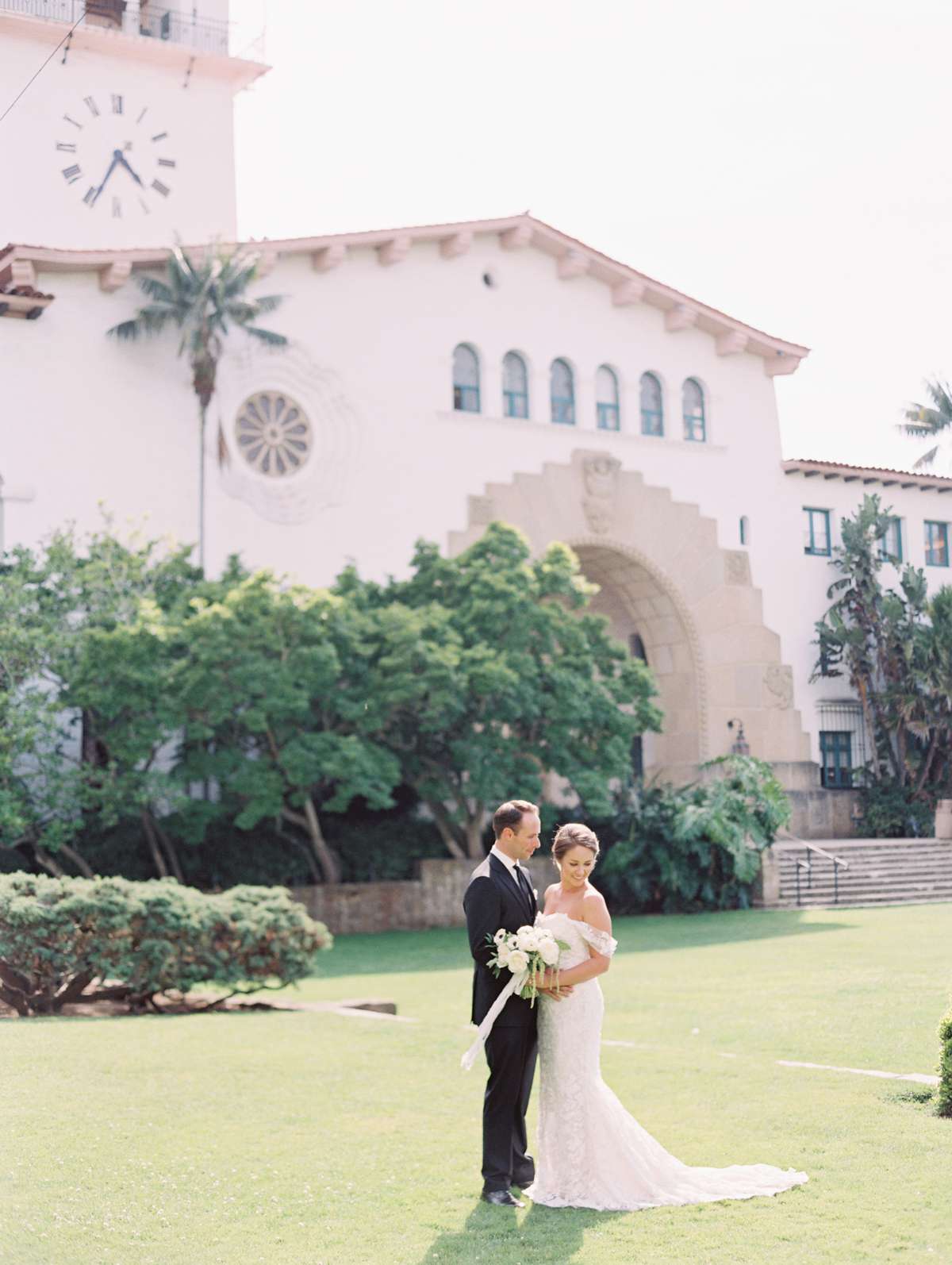 city hall wedding bride and groom on lawn outside of santa barbara county courthouse