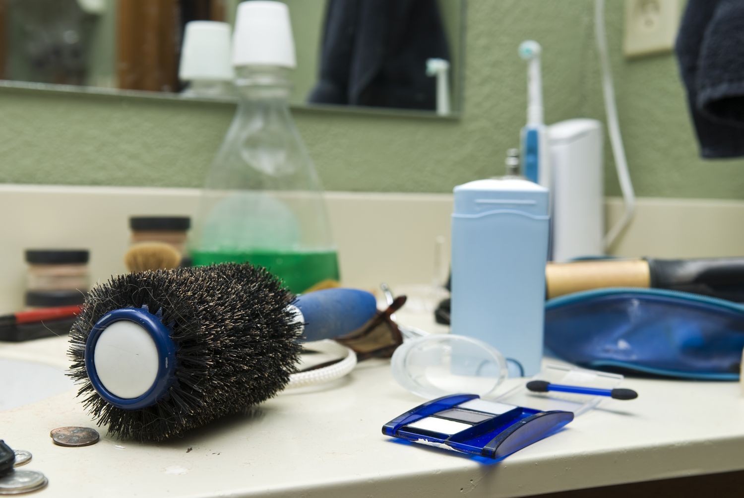 clutter on bathroom counter
