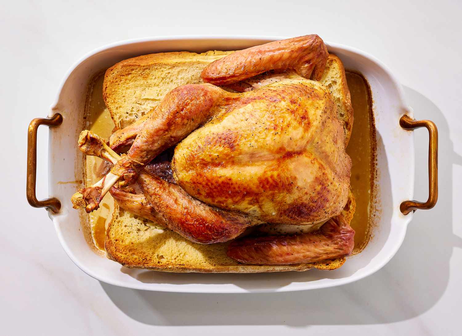 overhead view of cooked turkey in a casserole dish