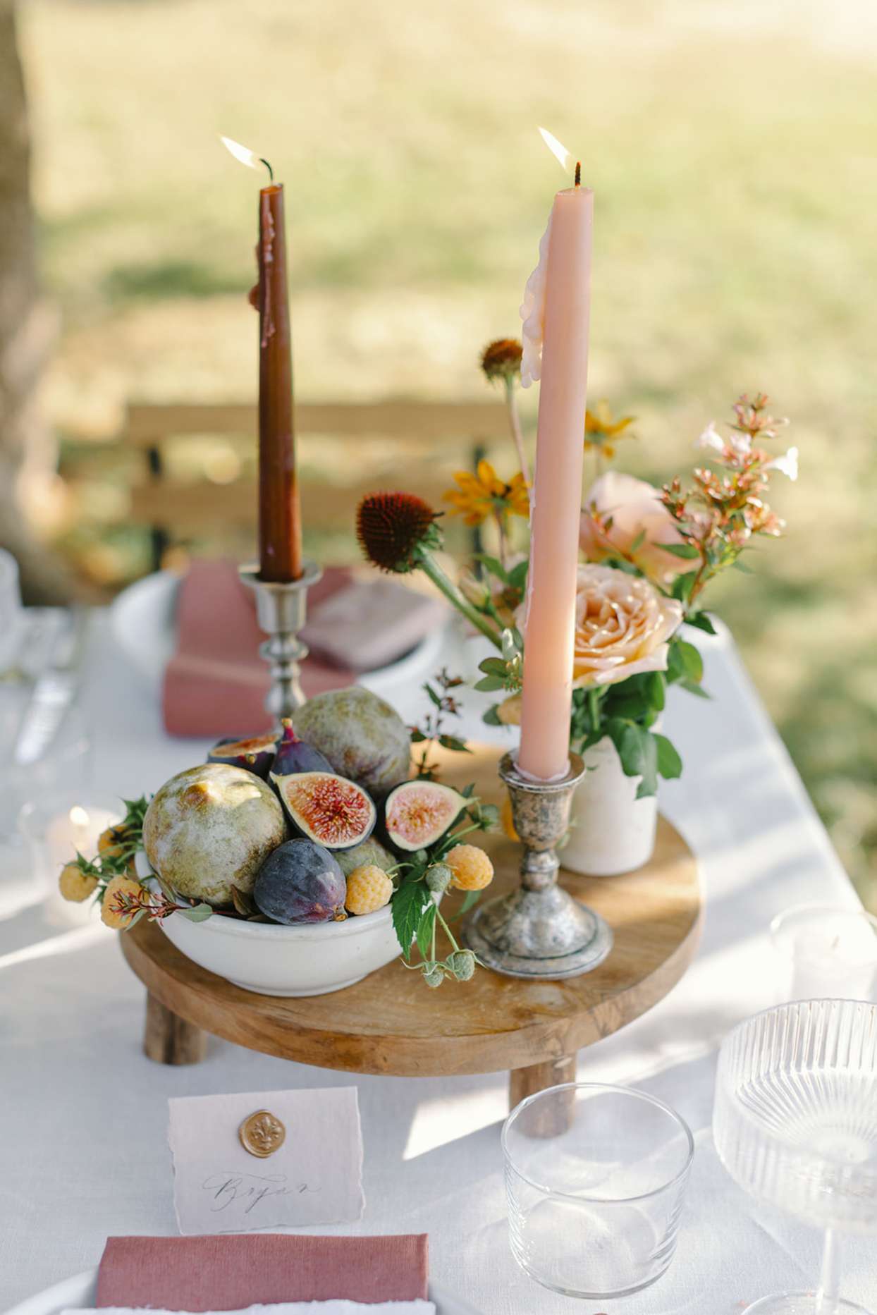 table arrangement with seating card and candles