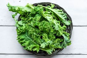 Stalks of kale in basket