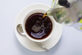 Pouring coffee into mug