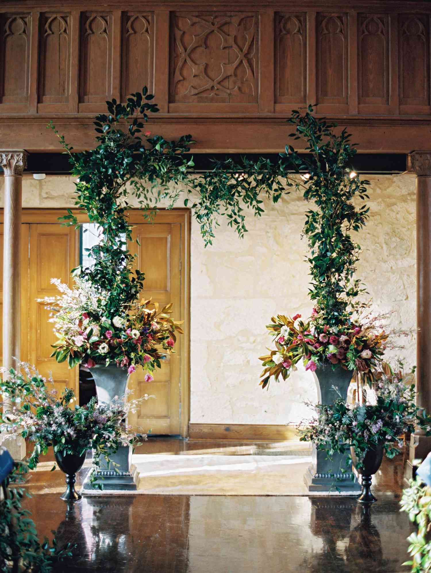 Unkempt Willow Branch Wedding Arch with Pink and Orange Flowers