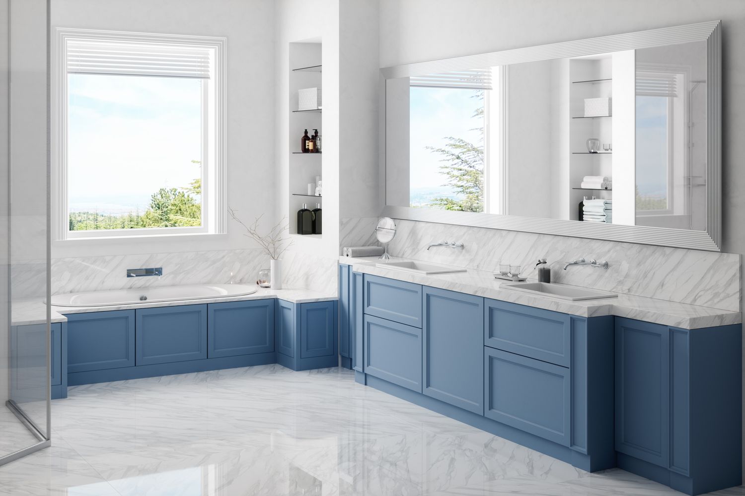 A modern bathroom with blue cabinets large mirrors and a bathtub under a window