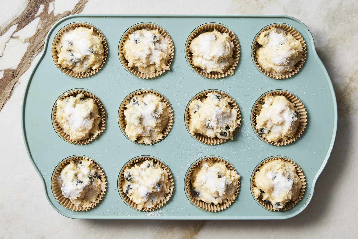 Baked lemon blueberry muffins in cupcake pan