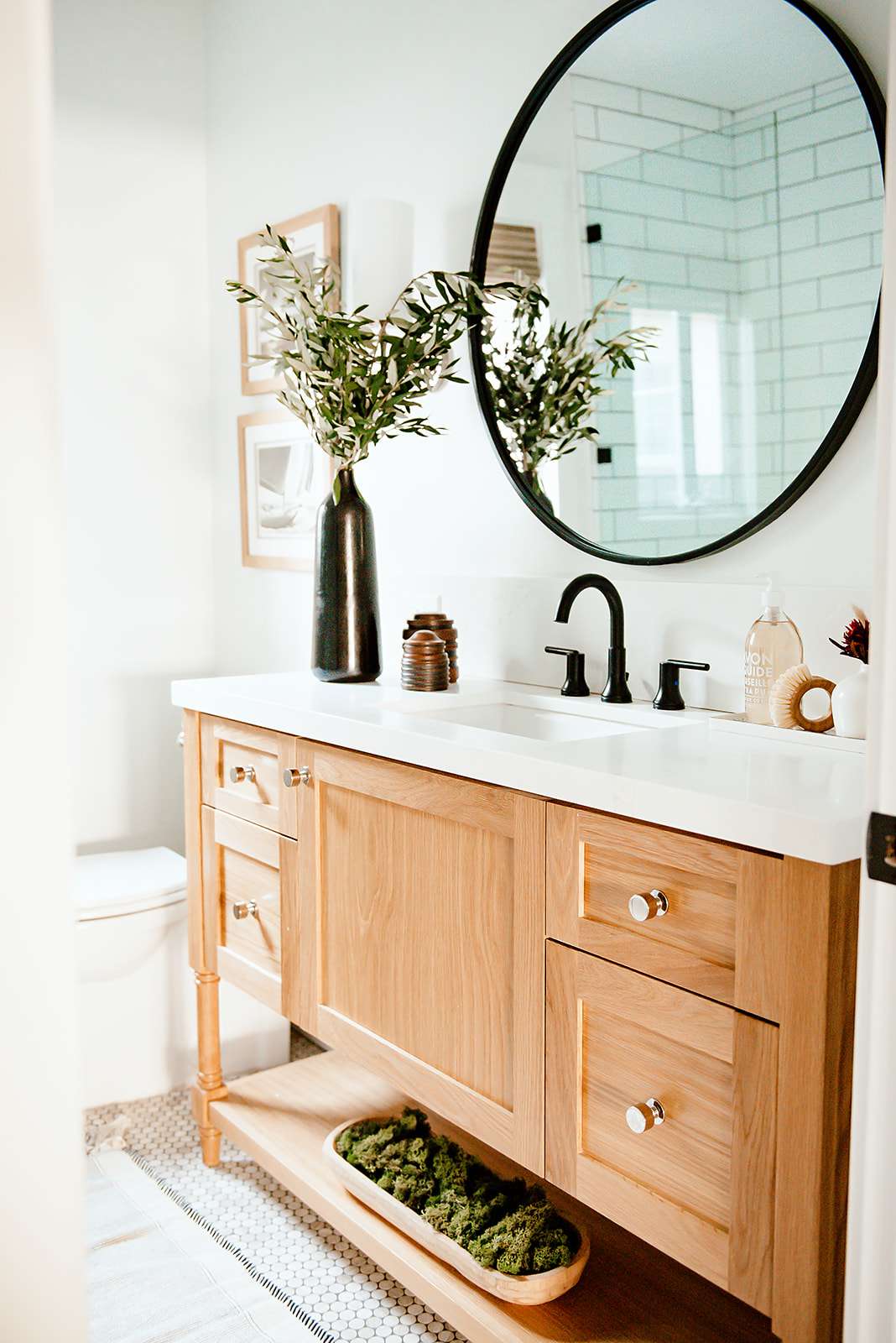 guest bathroom with black accents white walls