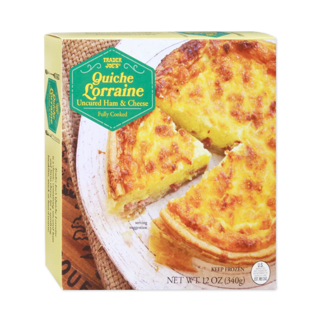 Box of Trader Joes Quiche Lorraine with a sliced quiche on the packaging