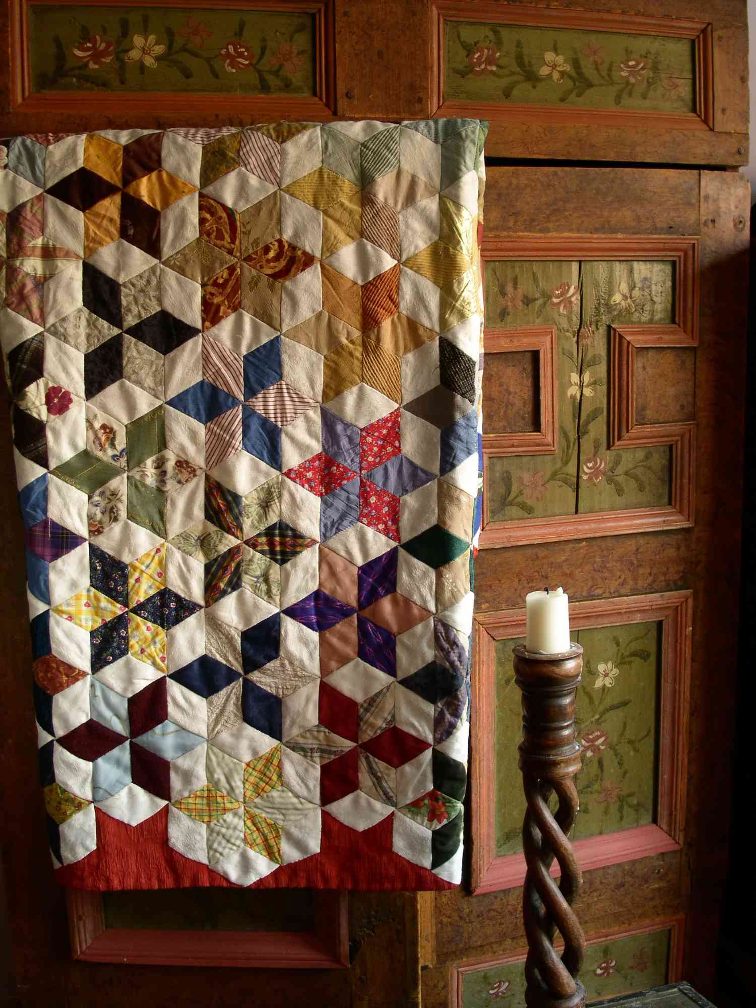 A quilt and a wardrobe