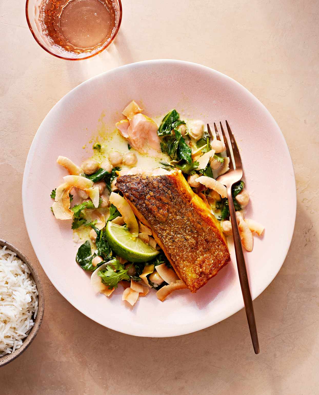 crispy salmon with coconut-ginger collards served with fresh cilantro