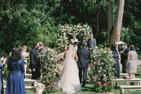 bride walking processional with dad