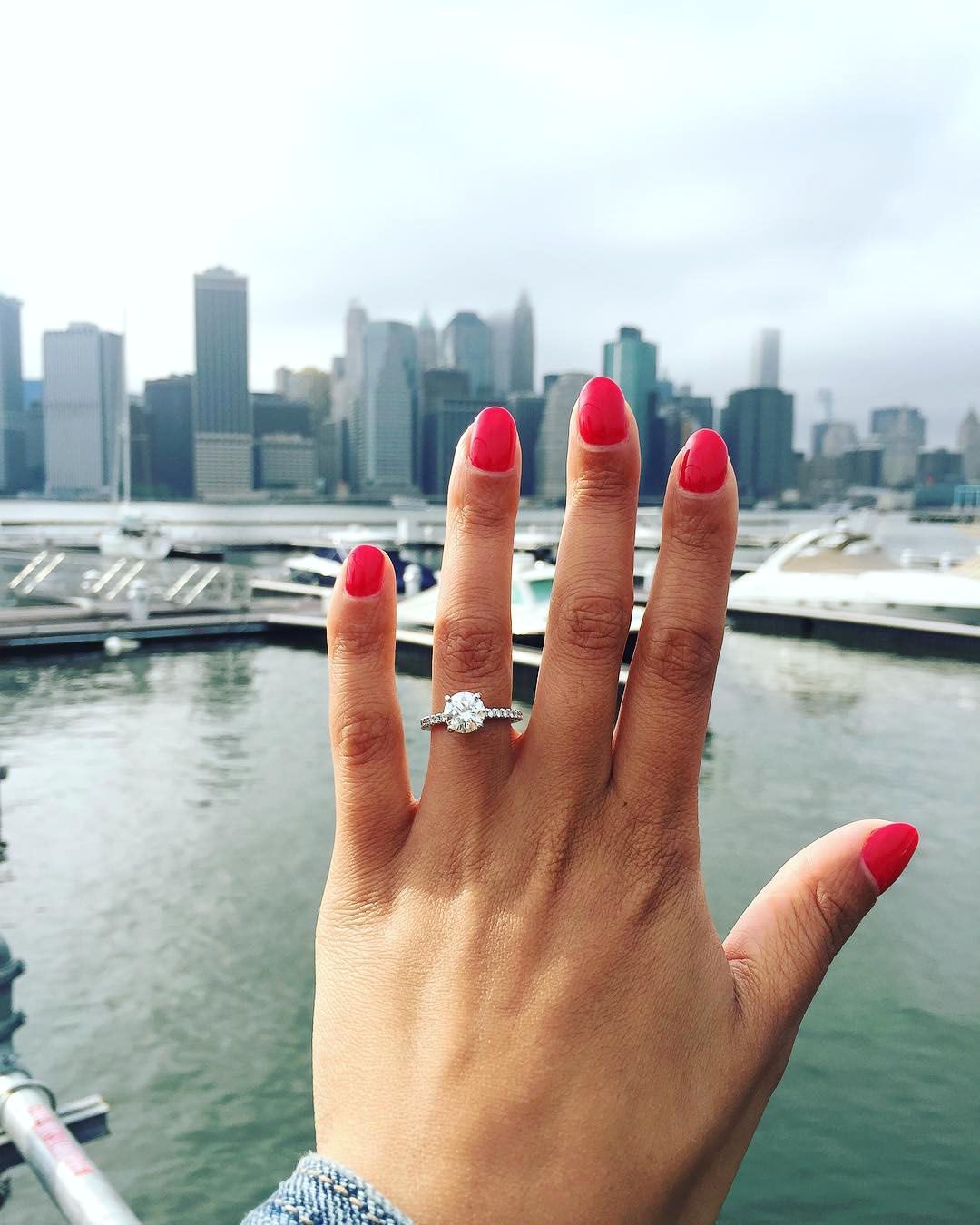 engagement ring selfie skyline view