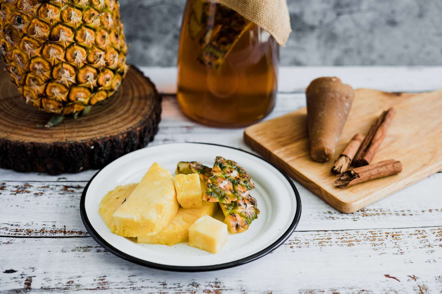 pineapple scraps and jar of tepache