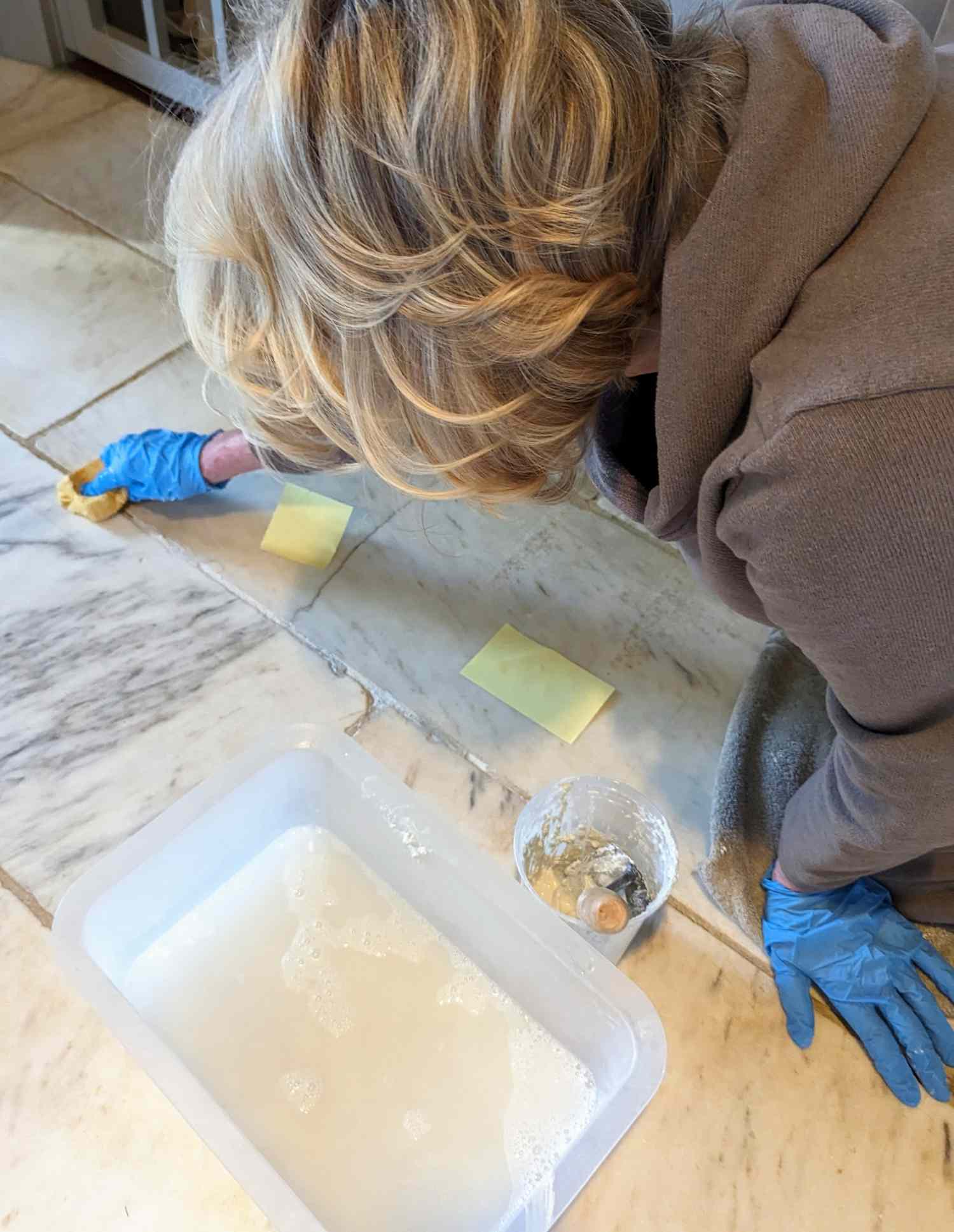 decorvow re-grouting her tiles